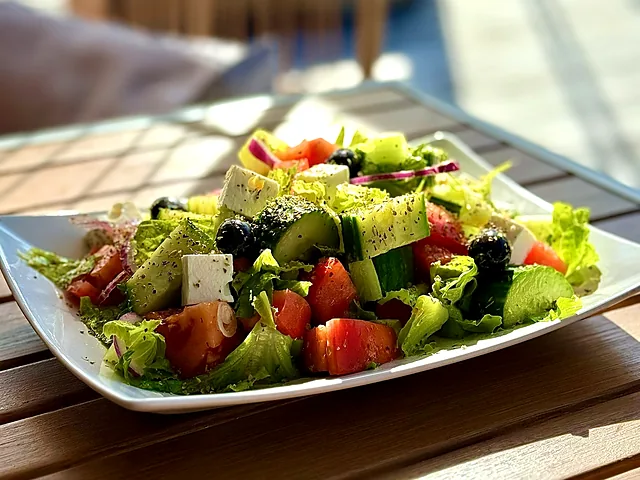 Greek salad with feta, olives and fresh vegetables