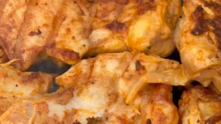Chicken over the charcoal grill